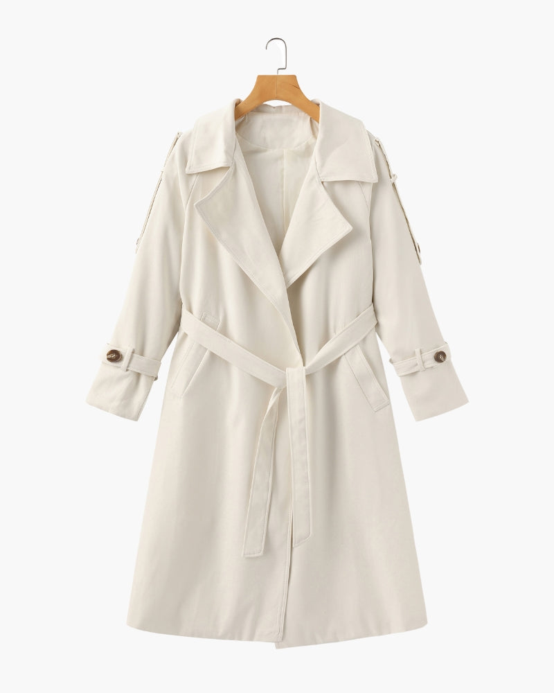 Women's classic cream belted trench coat mid-length with lapel collar, cuffed sleeves and detachable waist belt on hanger