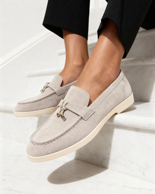 Women's beige suede bit loafer with gold hardware detail and off-white sole, luxury slip-on design