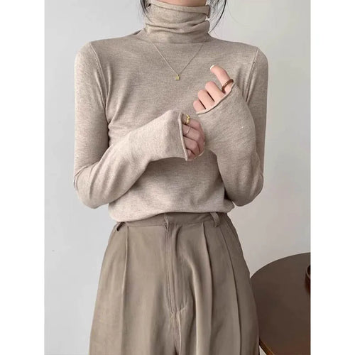 Elegant turtleneck knit pullover with long sleeves and ribbed edges Vohran UK