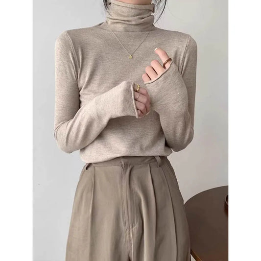 Elegant turtleneck knit pullover with long sleeves and ribbed edges Vohran UK