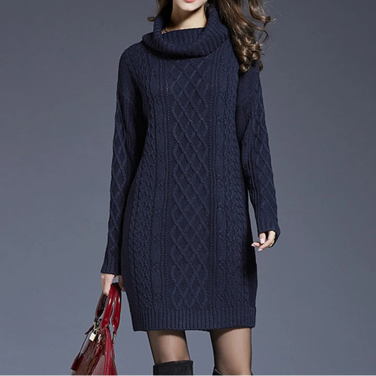 Elegant cable-knit turtleneck sweater dress with relaxed fit and soft winter texture by Vohran UK