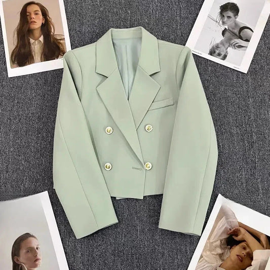 Elegant cropped double-breasted women’s blazer with tailored structure and metallic buttons by Vohran UK